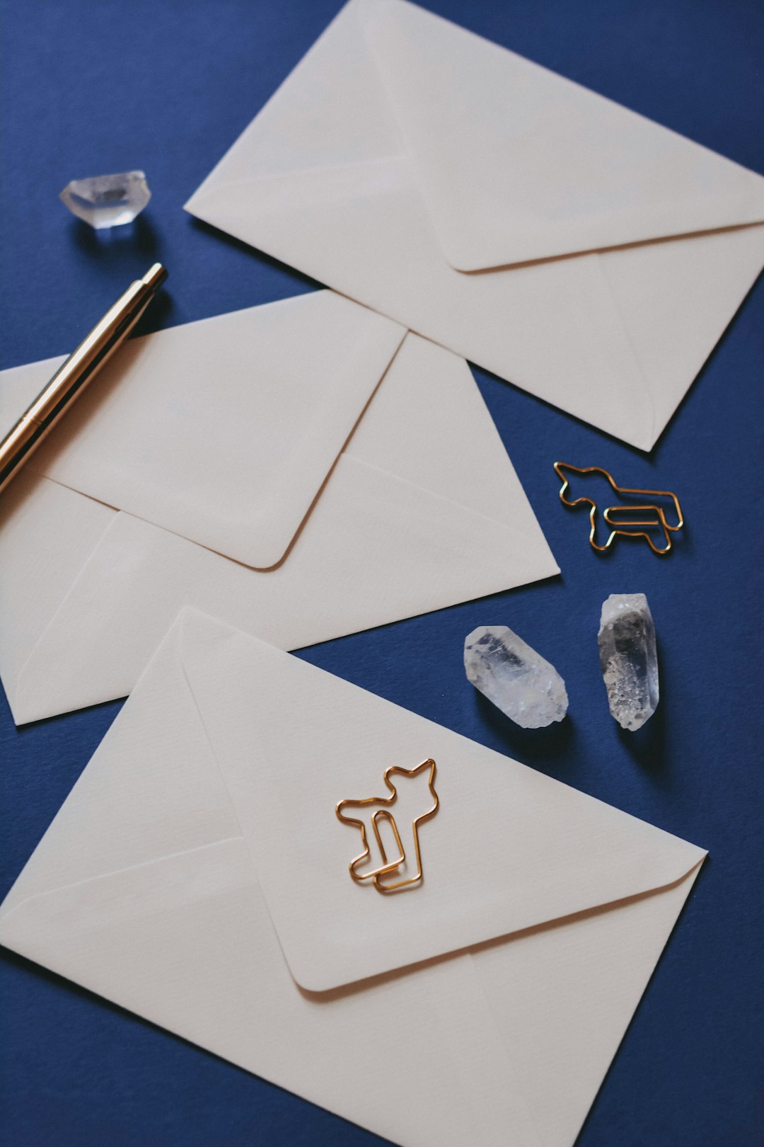 E-mail marketing. Pink envelopes on blue background ✦ Snag more FREE stock photos each month 👉 https://contentpixie.com/secret-snaps/